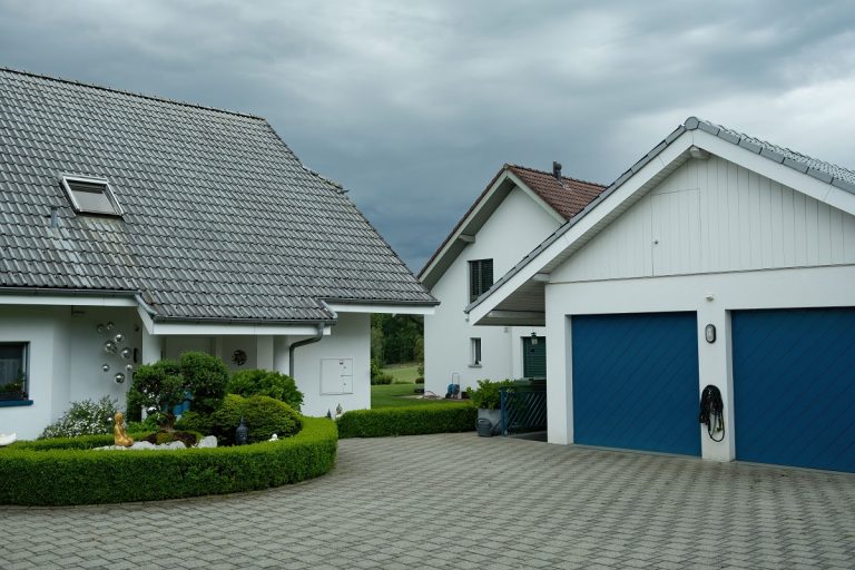 detached garage with blue doors